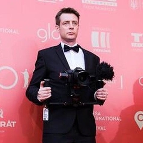 Conor OIFF red carpet tuxedo plus camera